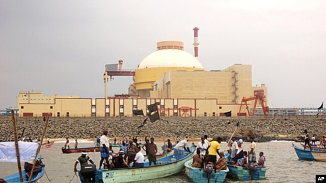 Local fishermen hold black flags during an anti-nuclear protest outside a Russian-built nuclear plant in Kudankalam region, in the southern Indian state of Tamil Nadu, November 21, 2011.