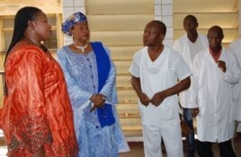 Deputy prosecutor of the International Criminal Court (ICC) Fatou Bensouda (L), flanked by Conakry central hospital's director Fatou Sikhe Camara (2ndL), listens to doctors on February 18, 2010 during a visit at Hospital Donka.