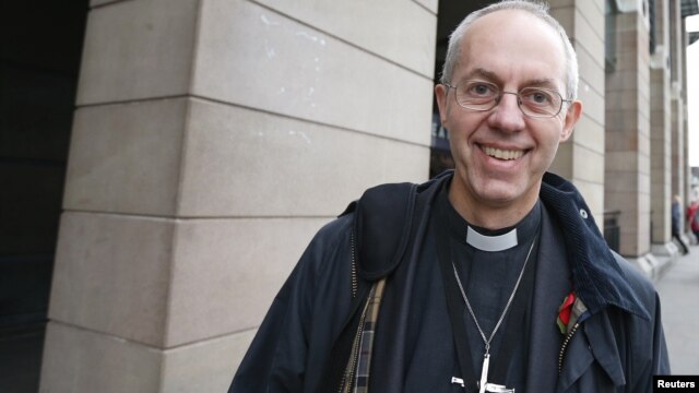 Justin Welby, the Bishop of Durham, walks through Westminster in London, November 8, 2012. 