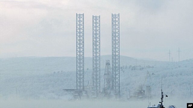 The "Kolskaya" oil drilling rig is pictured in the Kola Bay near Russia's northern seaport of Murmansk. The oil drilling rig with 67 crew on board capsized and sank off the Russian Far East island of Sakhalin when it ran into a storm while being towed, an