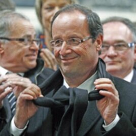 Francois Hollande visits the SAFRA industrial rail body factory on a campaign trip in Albi, France, April 16, 2012.