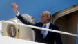 President Barack Obama waves as he boards Air Force One before his departure from Andrews Air Force Base, Md., May 2, 2013. 