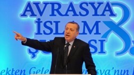 Turkish Prime Minister Recep Tayyip Erdogan addresses a meeting of Muslim religious leaders from Europe and Asia, in Istanbul, Turkey, Nov. 19. 2012.