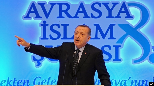 Turkish Prime Minister Recep Tayyip Erdogan addresses a meeting of Muslim religious leaders from Europe and Asia, in Istanbul, Turkey, Nov. 19. 2012.