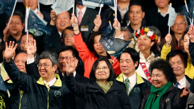 Taiwan's Democratic Progressive Party, DPP, presidential candidate, Tsai Ing-wen, waves as she declares victory in the presidential election in Taipei, Taiwan, Jan. 16, 2016.