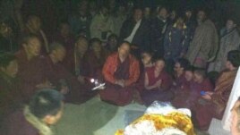 Local Tibetans gathered to pray for Kalsang Kyab after he self-immolated Tuesday.