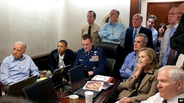 President Barack Obama and Vice President Joe Biden, along with national security team members, receive updates on the mission against Osama bin Laden, White House Situation Room, May 1, 2011. (AP/The White House)