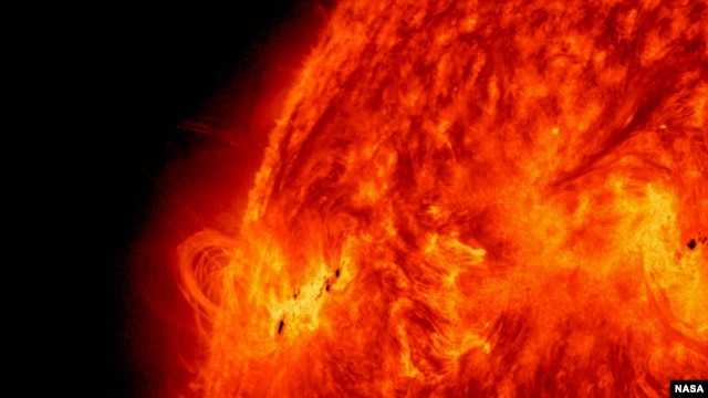 NASA's Solar Dynamics Observatory captured this image of the X1.2 class solar flare on May 14, 2013. The image show light with a wavelength of 304 angstroms. Credit: NASA/SDO