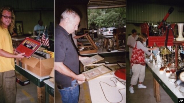 Auction customers Max Bovis (left), John Raccuglia (center) and Brooke Logan browse items at the Crumpton Auction in Maryland.