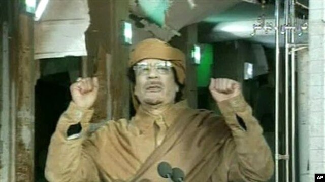 This image broadcast on Libyan state television Feb. 22, 2011, shows Libyan leader Moammar Gadhafi as he addresses the nation in Tripoli