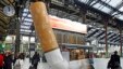 FILE - A symbolic cigarette butt is set up inside Gare de Lyon railway station, in Paris,  Dec. 4, 2012, as part of a publicity campaign against rudeness, by Paris's public transport authority.  