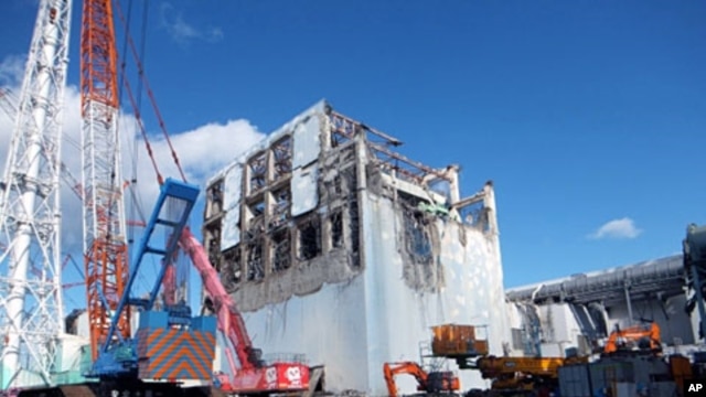 The crippled Fukushima Daiichi nuclear power plant's No.4 reactor building is seen after the removal of debris on the upper side of the unit in Fukushima prefecture, January 5, 2012