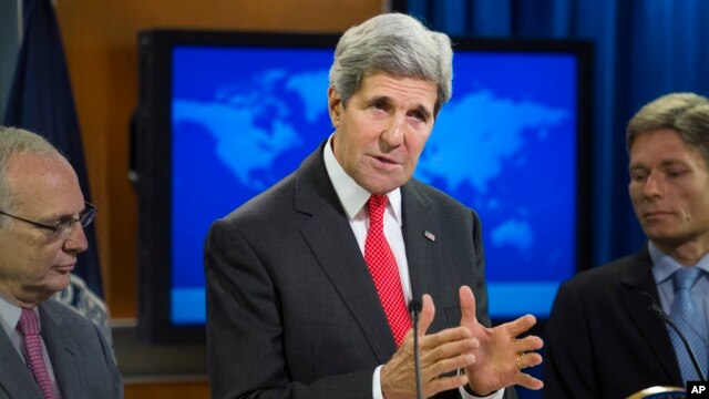 Ngoại trưởng John Kerry phát biểu tại Bộ Ngoại giao ở Washington trong cuộc họp báo công bố Báo cáo thường niên 2013 về Tự do Tôn giáo Quốc tế, ngày 28/7/2014.