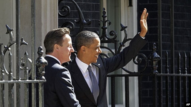 US President Barack Obama, right, with British Prime Minister David Cameron in front of 10 Downing Street in London, Wednesday, May 25, 2011