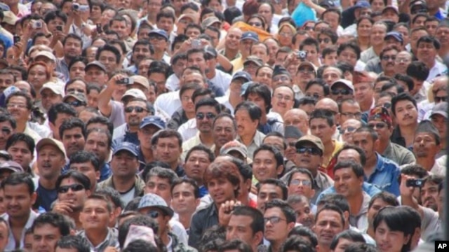 Faces in the crowd at the peace assembly in Kathmandu, 07 May 2010