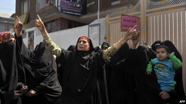 Activists of Kashmir's right wing all-woman organisation Dukhtaran-E-Milat (Daughters of the Faith) shout anti-US slogans during a protest in Srinagar, Sept. 21, 2012