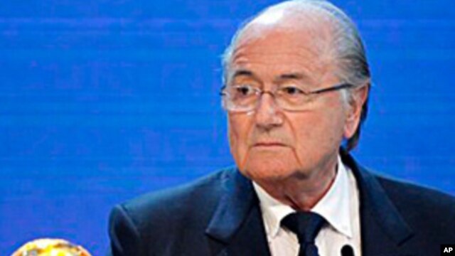 FIFA President Sepp Blatter announces Russia to host 2018 World Cup during press conference, 2 Dec. 2010