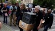 People protest against the outsourcing of jobs by Carrier at a rally hosted by the United Steel Workers and the AFL-CIO at the Statehouse in Indianapolis, Indiana, April 29, 2016.