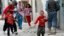 Children run from explosions in busy part of Kabul, May 24, 2013. 