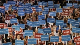 Delegates hold up signs during Maryland Gov. Martin O’Malley speech at the Democratic National Convention in Charlotte, N.C., on Tuesday, Sept. 4, 2012. 