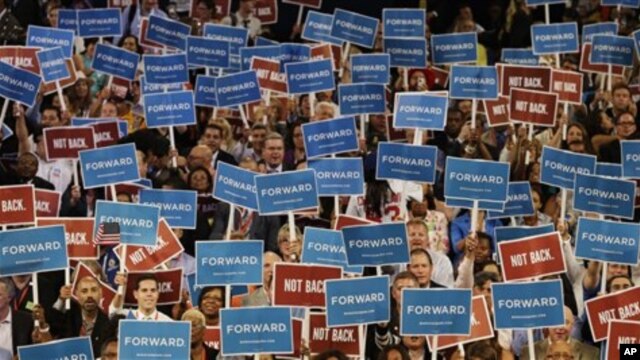Delegates hold up signs during Maryland Gov. Martin O’Malley speech at the Democratic National Convention in Charlotte, N.C., on Tuesday, Sept. 4, 2012. 