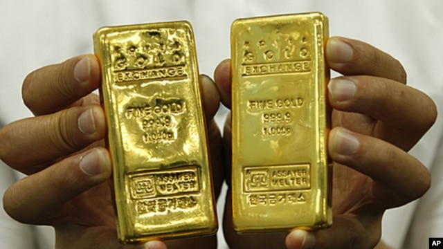 Gold bars are shown at the Korea Gold Exchange in Seoul, South Korea. Gold's allure stems in part from fears that the world's major economies are dangerously indebted,  August 9, 2011