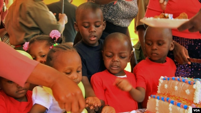Children of female prisoners celebrate the opening of a new day care facility at the Langata Women's Prison in Nairobi, Jan. 23, 2013.