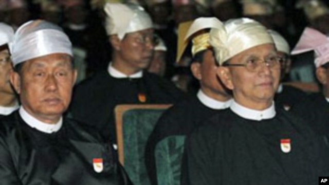 Burma President Thein Sein, right, and Vice President Thiha Thura Tin Aung Myint Oo are pictured in this February 2011 file photo. Burma's junta was officially disbanded after handing over power to a new so-called civilian government, March 30, 2011