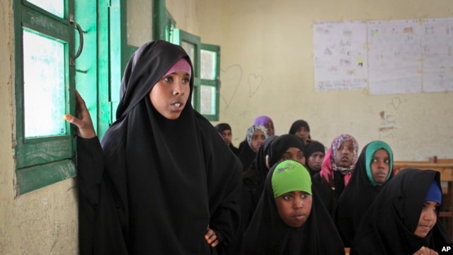 Teen-aged girls attend an after-school discussion of female genital mutilation at the Sheik Nuur Primary School in Hargeisa, Somaliland on Feb. 16, 2014. 