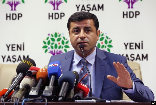 FILE - Pro-Kurdish Peoples' Democracy Party leader Selahattin Demirtas is seen speaking during a news conference in Ankara, Turkey, July 21, 2015.