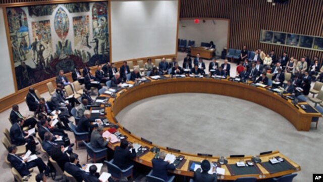 Current U.N. Security Council President and British Ambassador to the U.N. Lyall Grant reads a "Presidential statement" agreed to by the Security Council, including Russia and China, that backs U.N.-Arab League envoy Kofi Annan's bid to end violence on Sy