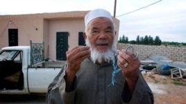 Mohamed talks about farming under the Gadhafi regime, April 9, 2012. (Stephanie Figgins)