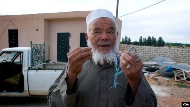 Mohamed talks about farming under the Gadhafi regime, April 9, 2012. (Stephanie Figgins)