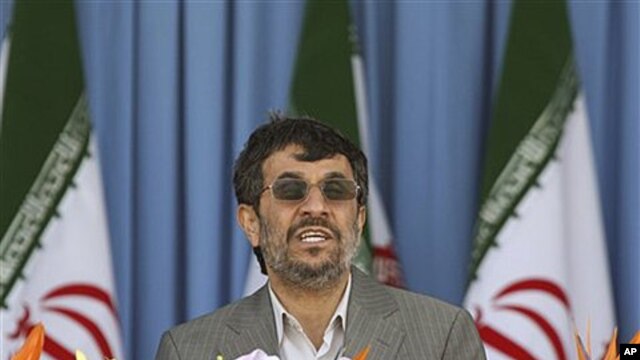 Iranian President Mahmoud Ahmadinejad delivers his speech, during army parade, marking national Army Day in front of the mausoleum of the late revolutionary founder Ayatollah Khomeini near Tehran, Iran, Monday, April 18, 2011