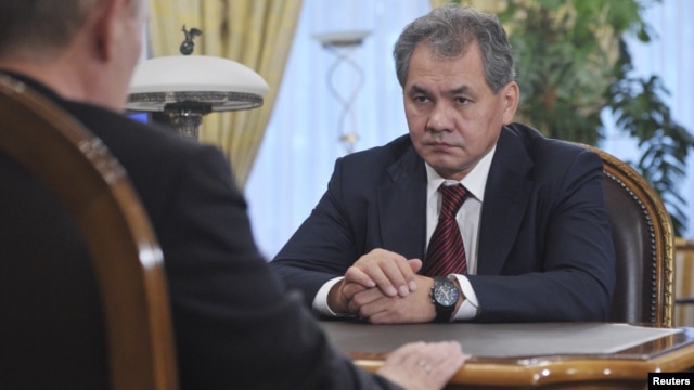 Newly-appointed Defense Minister Sergei Shoigu meets with Russian President Vladimir Putin at the Novo-Ogaryovo state residence outside Moscow, November 6, 2012. 