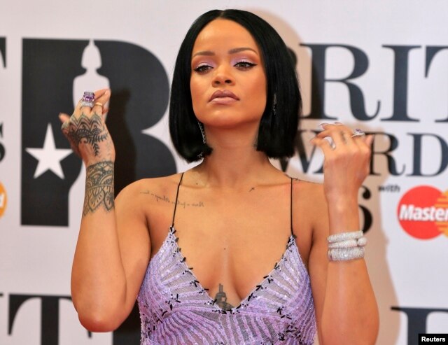 Rihanna arrives at the BRIT Awards at the O2 arena in London, Feb. 24, 2016.