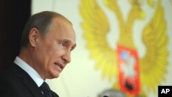 Russia's President Vladimir Putin addresses Russian Ambassadors during their meeting in the Foreign Ministry, in Moscow, July 9, 2012.