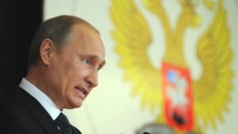  Russia's President Vladimir Putin addresses Russian Ambassadors during their meeting in the Foreign Ministry, in Moscow, July 9, 2012. 