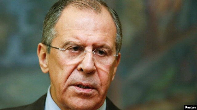 Russian Foreign Minister Sergei Lavrov speaks to reporters after a meeting with his Saudi Arabian counterpart, Saud al-Faisal, in Moscow, Nov. 21, 2014.