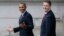 President Barack Obama and White House Senior Advisor Dan Pfeiffer, right, react to a reporter's question as they leave the Treasury Department in Washington,  Jan. 16, 2013.