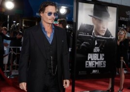 Johnny Depp arrives at the premiere of "Public Enemies" in Los Angeles on Tuesday, June 23, 2009. (AP Photo/Matt Sayles)