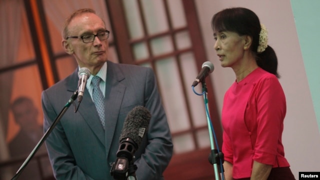 Burmese pro-democracy leader Aung San Suu Kyi after a meeting with Australian Foreign Minister Bob Carr, Yangon June 6, 2012.