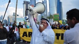 The first climate change rally ever in the streets of Doha Qatar at the UN Climate Change meeting. (Richard Casson, Oxfam)