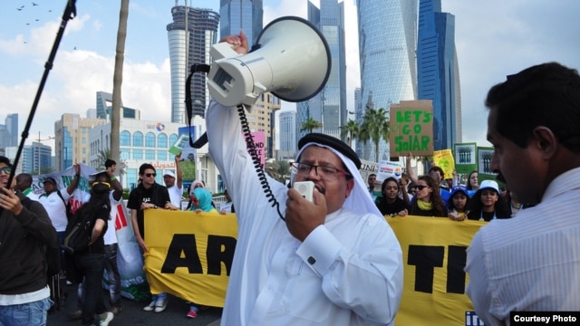 The first climate change rally ever in the streets of Doha Qatar at the UN Climate Change meeting. (Richard Casson, Oxfam)