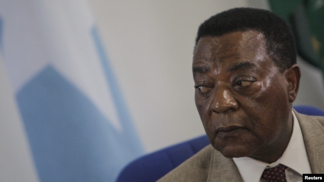 Augustine Mahiga, Special Representative of the United Nations Secretary General for Somalia and head of the U.N. Political Office in Somalia (UNPOS), looks on during a news conference in Mogadishu August 19, 2012, in this photograph released by the Afric