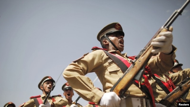 Military academy cadets march during a parade marking the 22nd anniversary of Yemen's reunification in Sanaa May 22, 2012. 