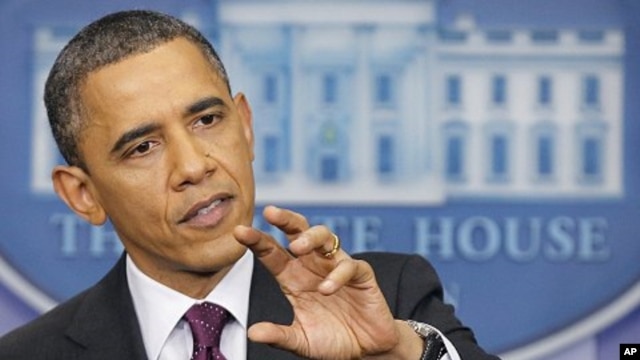 President Barack Obama gestures during a news conference at the White House, Tuesday, March 6, 2012. 
