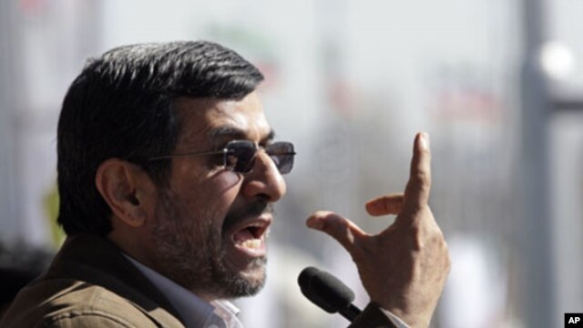 Iranian President Mahmoud Ahmadinejad gestures as he deliver his speech at a rally to mark the 33rd anniversary of the Islamic Revolution, Tehran, Feb. 11, 2012.