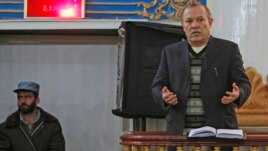 Sherkan Farnood, founder of Kabulbank, speaks in court in Kabul, March 5, 2013. 