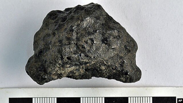 Image of the 58 g Tissint specimen from the University of Alberta Meteorite Collection.